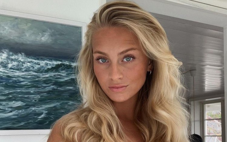 Ex-Malinwa-WAG Amanda maakt Belgische fans helemaal gek met diepe inkijk